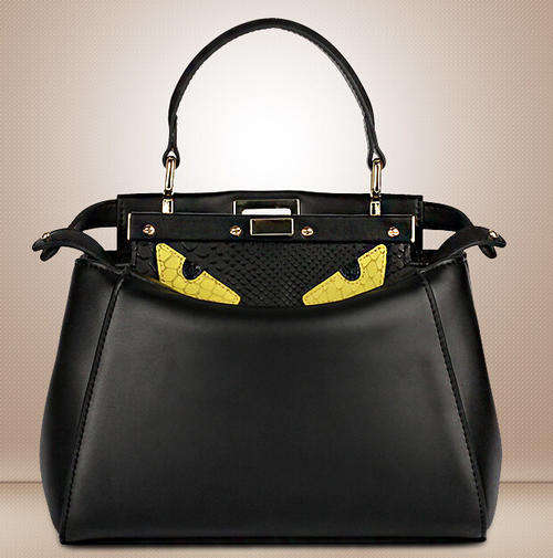 Genuine leather cute monster ladies handbag.Black color.