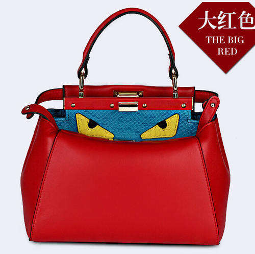 Genuine leather cute monster ladies handbag.Red color.