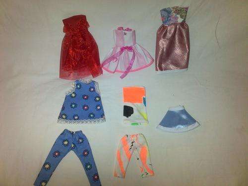 assorted hand made barbie doll clothes