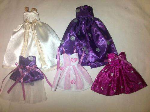 assorted hand made barbie doll clothes