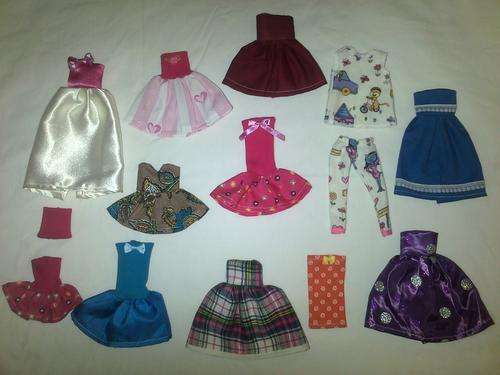 assorted pack of handmade barbie clothes