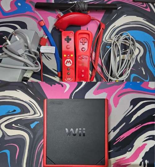 Wii + limited Mario cart racing game and x3 remotes + 6 games note Mario cart disc is in console