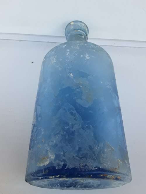 Antique light blue Woodward Chemist bottle