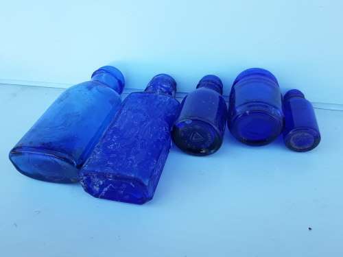 5 Vintage Cobalt blue bottles