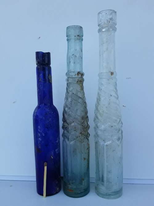 Two Oil type and a Castor oil bottle