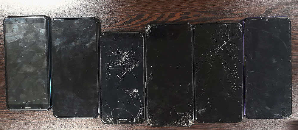 Collection of broken smartphones for spares