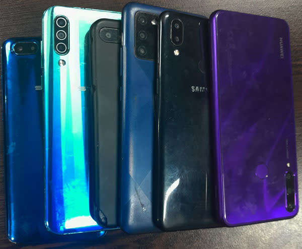 Collection of broken smartphones for spares