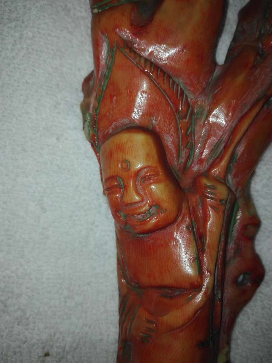 Antique Man with money bag.Hand carved  Coral 300 x 50 x 120 mm Chinese