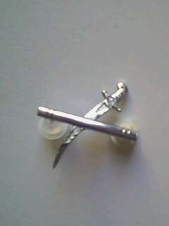 SA Army General rank insignia, sword & scavalt forming a cross.