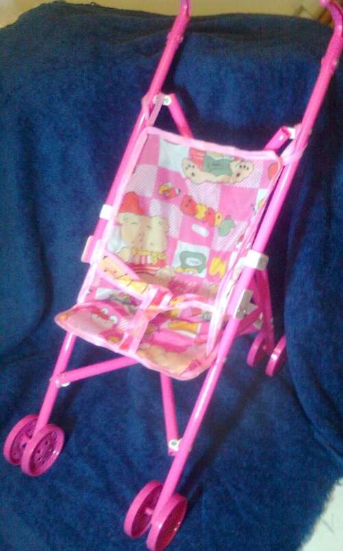 PRAM PLUS FREE SET OF BABY GIRL CLOTHES