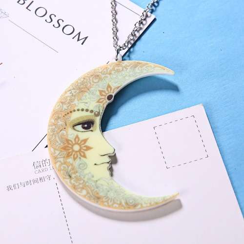 ACRYLIC MOON WITH FLOWERS NECKLACE