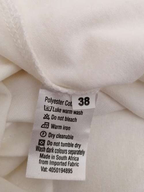 Cream Top With Ruched Front