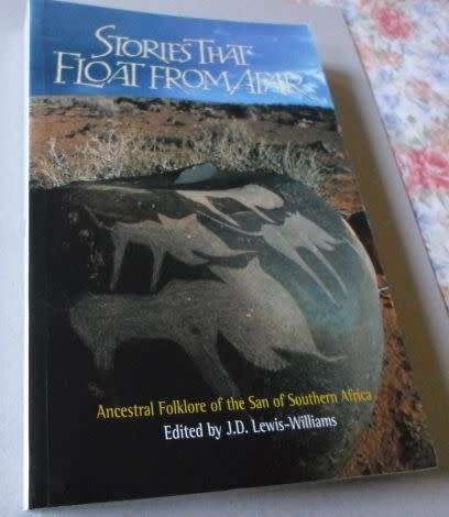 STORIES THAT FLOAT FROM AFAR - ANCESTRAL FOLKLORE OF THE SAN OF SOUTHERN AFRICA  ( weight 400 grams