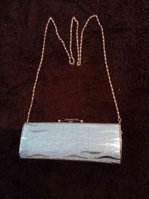Light blue glitter clutch bag as new