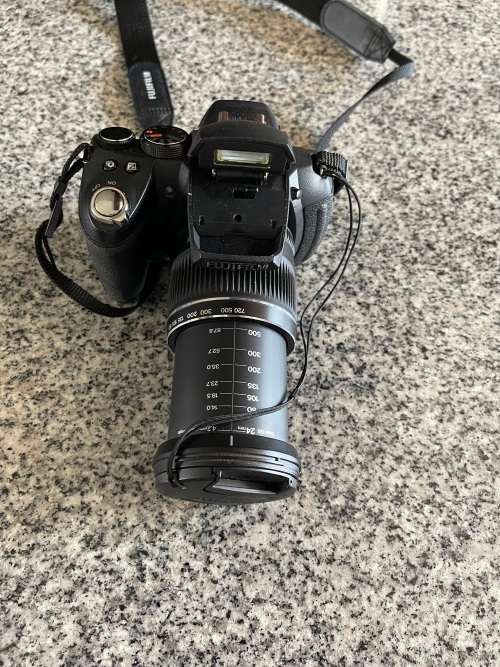 Fujifilm FinePix HS10 10 MP CMOS Digital Camera with 30x Wide Angle Optical Zoom and 3-Inch LCD