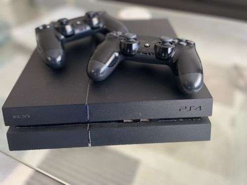 SONY PLAYSTATION 4  1TB WITH 2 CONTROLLERS and 6 GAMES
