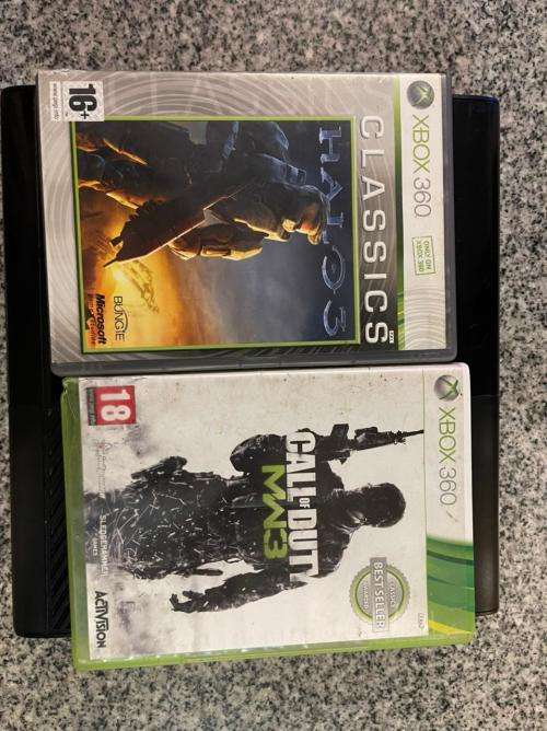 X BOX 360 E 500GB WITH 2 CONTROLLERS and 2 GAMES