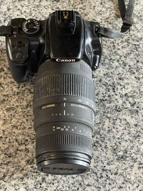 Canon EOS 400D CAMERA + SIGMA 18-55mm Lens,SIGMA 70-300MM LENS and EXTRA BATTERY PLUS EXTRAS