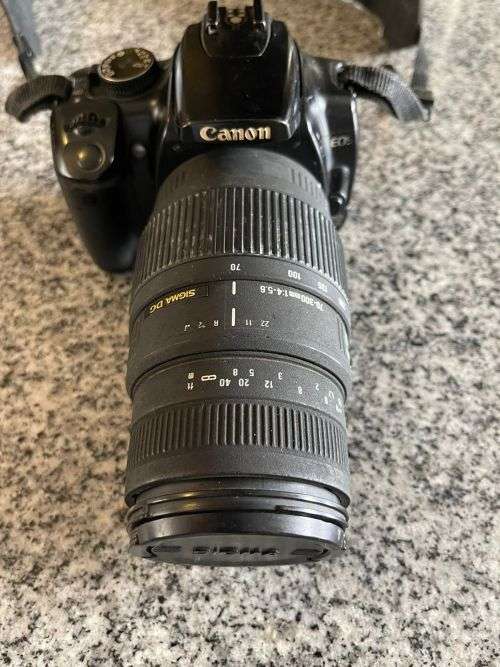 Canon EOS 400D CAMERA + SIGMA 18-55mm Lens,SIGMA 70-300MM LENS and EXTRA BATTERY PLUS EXTRAS