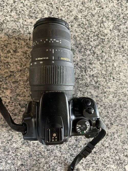 Canon EOS 400D CAMERA + SIGMA 18-55mm Lens,SIGMA 70-300MM LENS and EXTRA BATTERY PLUS EXTRAS