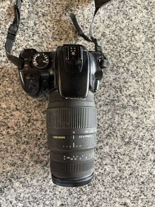 Canon EOS 400D CAMERA + SIGMA 18-55mm Lens,SIGMA 70-300MM LENS and EXTRA BATTERY PLUS EXTRAS
