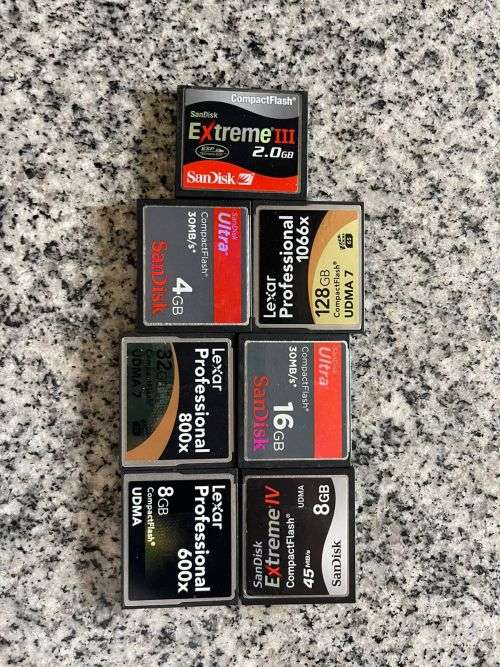 Canon EOS 400D CAMERA + SIGMA 18-55mm Lens,SIGMA 70-300MM LENS and EXTRA BATTERY PLUS EXTRAS