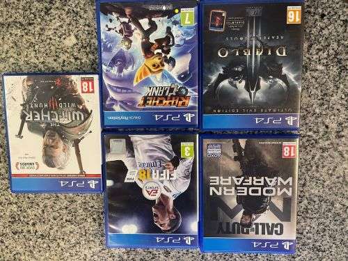 PLAYSTATION SLIM 500GB  WITH 5 GAMES and 2 CONTROLLERS