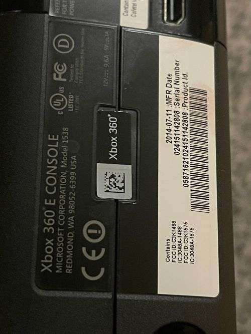 X BOX 360 E 250GB WITH 2 CONTROLLERS and 10 GAMES