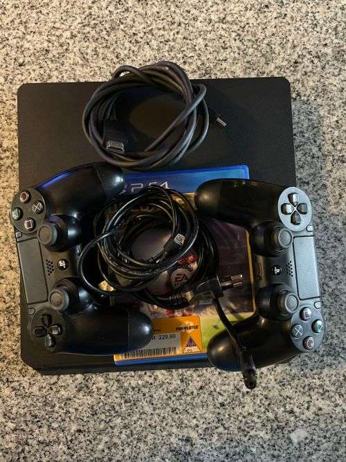 PLAYSTATION 4 SLIM 500GB  WITH 2 GAMES and 2 CONTROLLERS