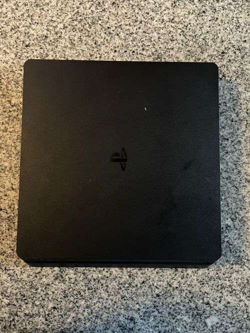 PLAYSTATION 4 SLIM 500GB  WITH 2 GAMES and 2 CONTROLLERS