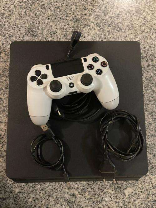 PLAYSTATION SLIM MINT CONDITION  500GB  WITH 2 GAMES and 1 CONTROLLER