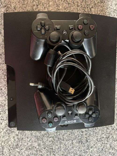 SONY PLAYSTATION 3 160GB WITH 2 CONTROLLERS and 8 GAMES