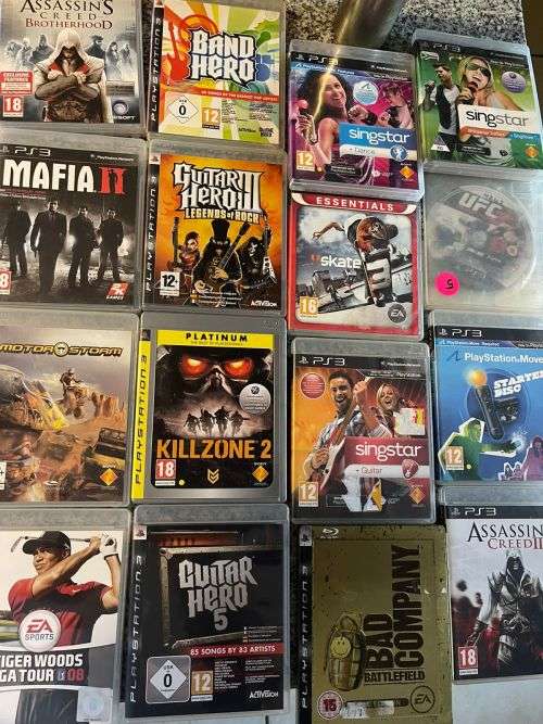 PLAYSTATION 3 SUPER SLIM 500GB 1 CONTROLLER and 17 GAMES