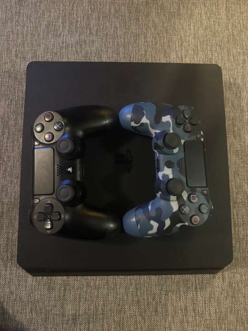 PLAYSTATION 4 SLIM 500GB WITH 6 GAMES and 2 CONTROLLERS