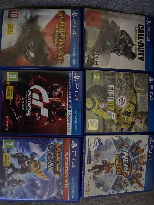 PLAYSTATION 4 SLIM 500GB WITH 6 GAMES and 2 CONTROLLERS