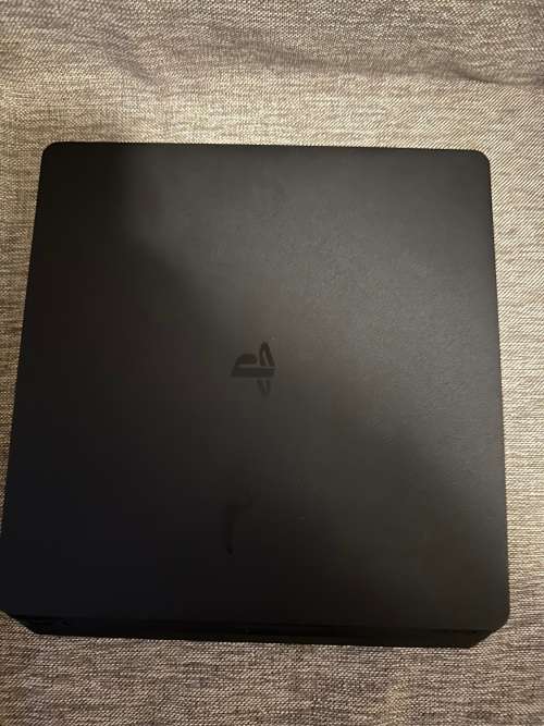 PLAYSTATION 4 SLIM 1TB WITH 8 GAMES and 2 CONTROLLERS