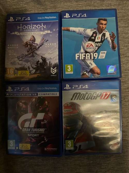 PLAYSTATION 4 SLIM 1TB WITH 8 GAMES and 2 CONTROLLERS