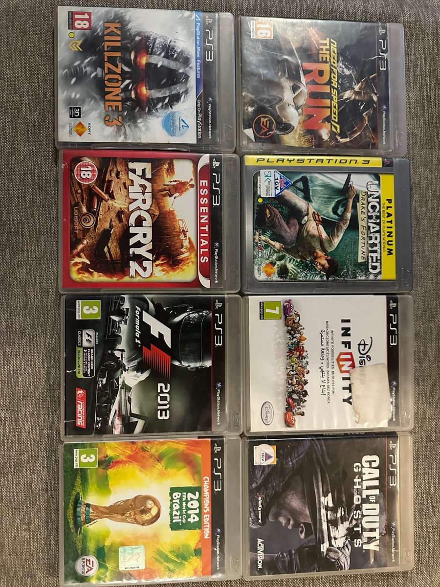 PLAYSTATION 3 SLIM 500GB 2 CONTROLLERS & 12 GAMES