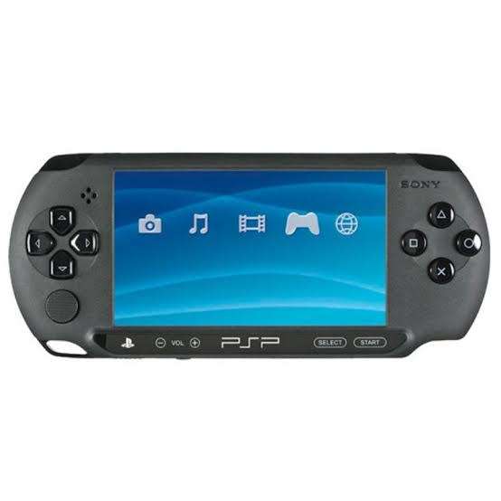 Sony psp street E1008 with 4gb memory card and 5 games.