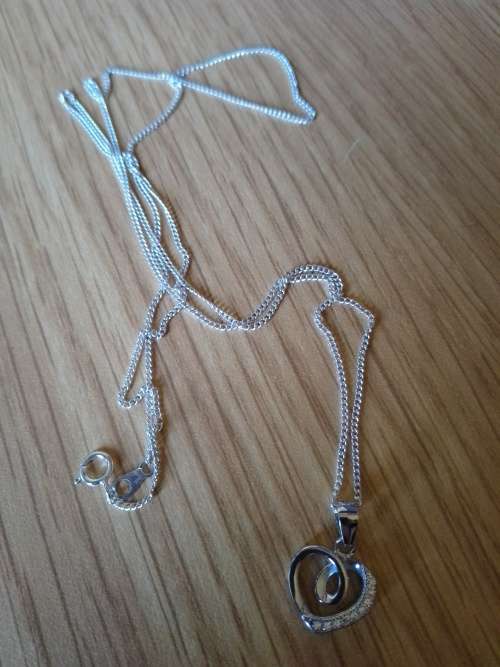 Sterling silver heart pendant with cubic zirconia stones