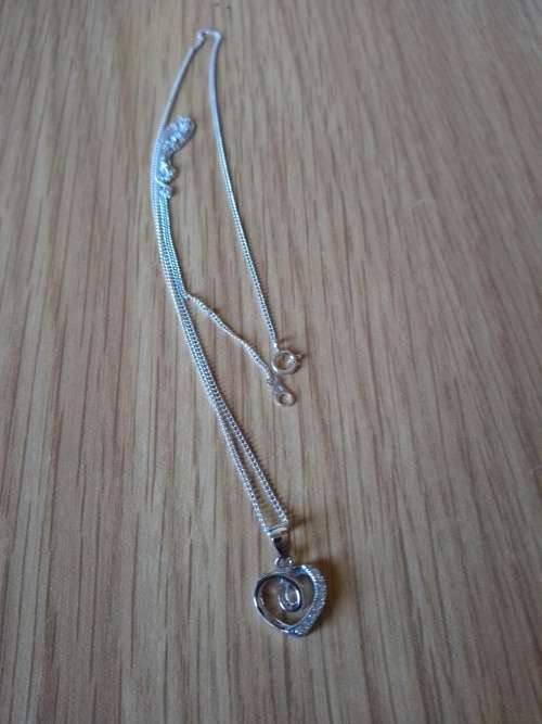 Sterling silver heart pendant with cubic zirconia stones