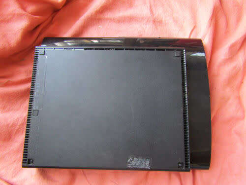 PS3 SUPER SLIM 500GB HDD WITH 45 GAMES AND TWO CONTROLLERS
