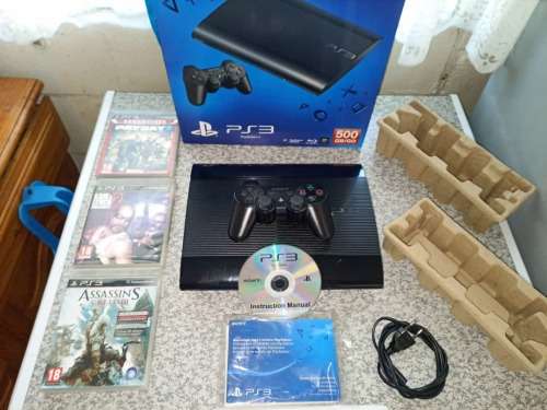 500GB HDD PS3 SUPERSLIM EXCELLENT CONDITION WITH 65 POPULAR PS3 GAMES LOADED AND 3000 RETRO ARCADE