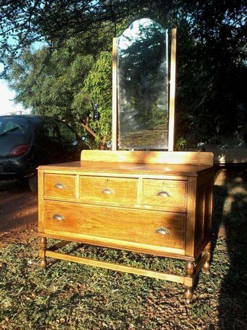 Very pretty Antique dressing table in old english oak . Free delivery in Jhb Pta . 1920's