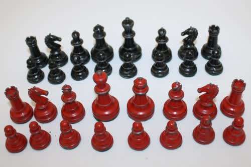 STAUNTON RED AND BLACK LEAD CHESS SET