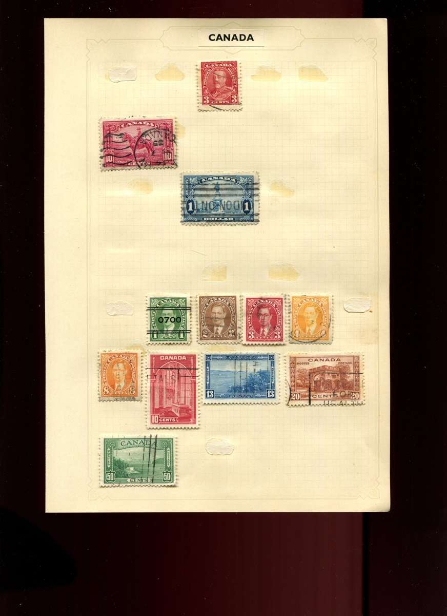 Canada - 12 Stamps Mounted on Old Album Page