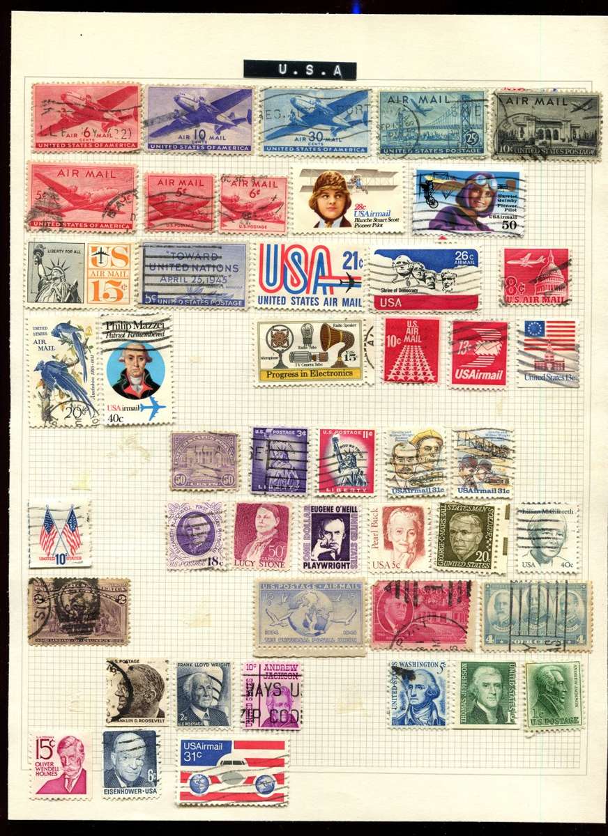 USA - 46 Stamps on Old Album Page