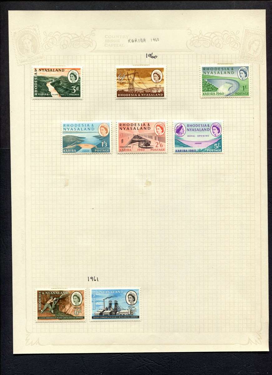Rhodesia and Nyasaland - 8 Stamps Mounted On Old Album Page