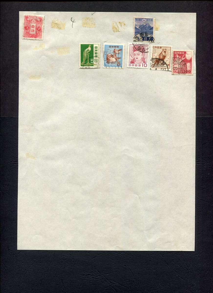 Japan - 7 Stamps Mounted (Hinged) on Old Album Page