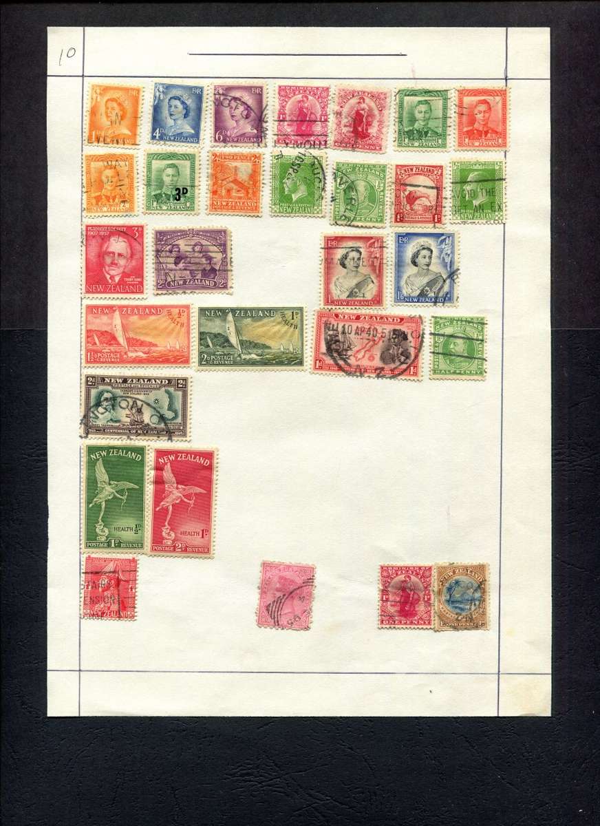 New Zealand - 29 Stamps Mounted (Hinged) on Old Album Page